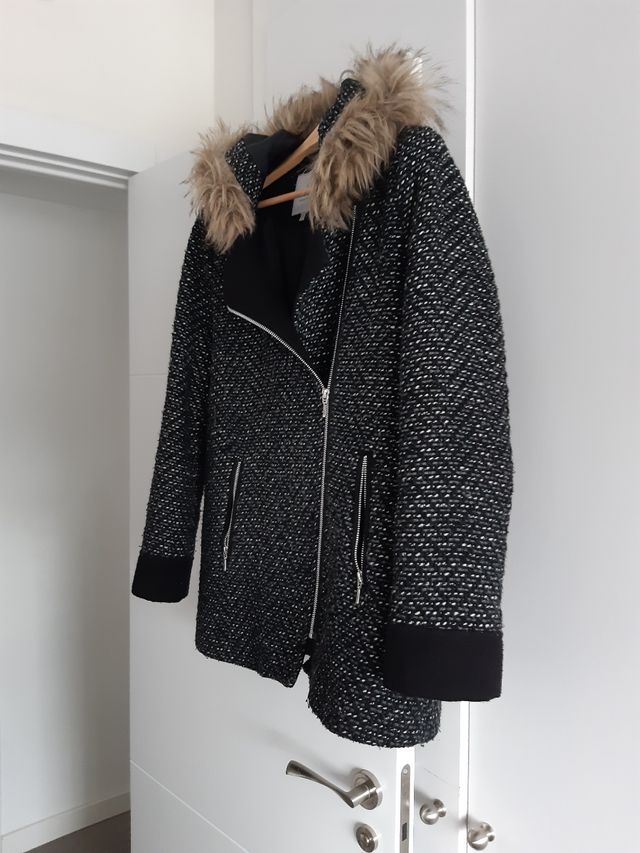 abrigo diseñador Roberto Torreta