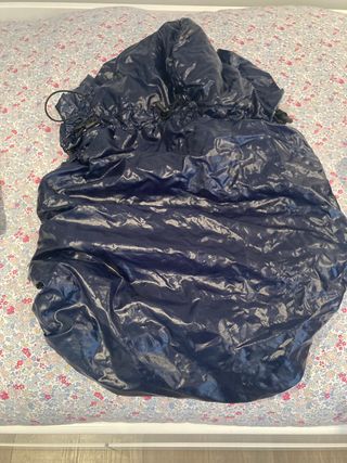 Mochila portabebes Ergobaby y funda impermeable