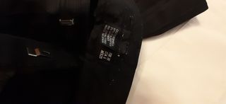 Pantalón negro recto con brillo