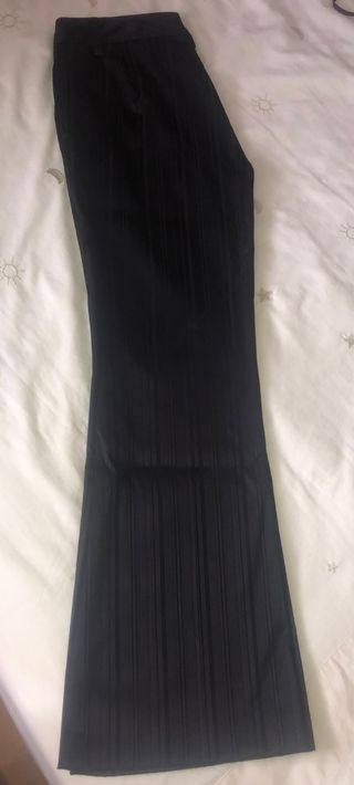 Pantalón negro recto con brillo
