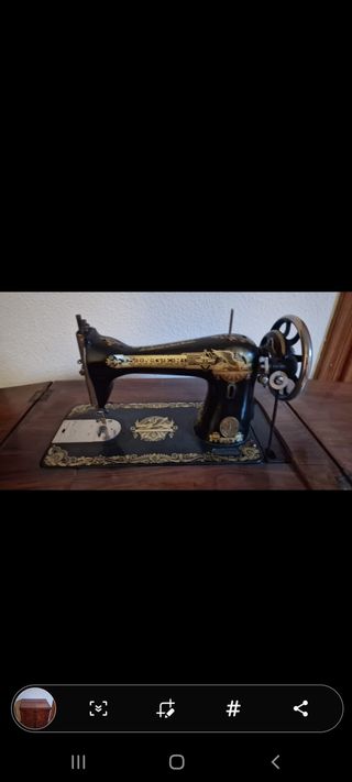 Maquina de coser Singer