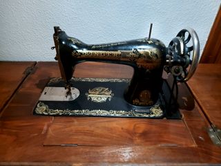 Maquina de coser Singer