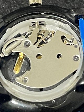 Reloj Vintage metálico con tapa PLUTO cuarzo 