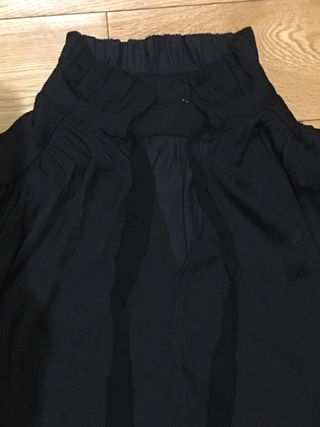 Blusa negra tela brillo