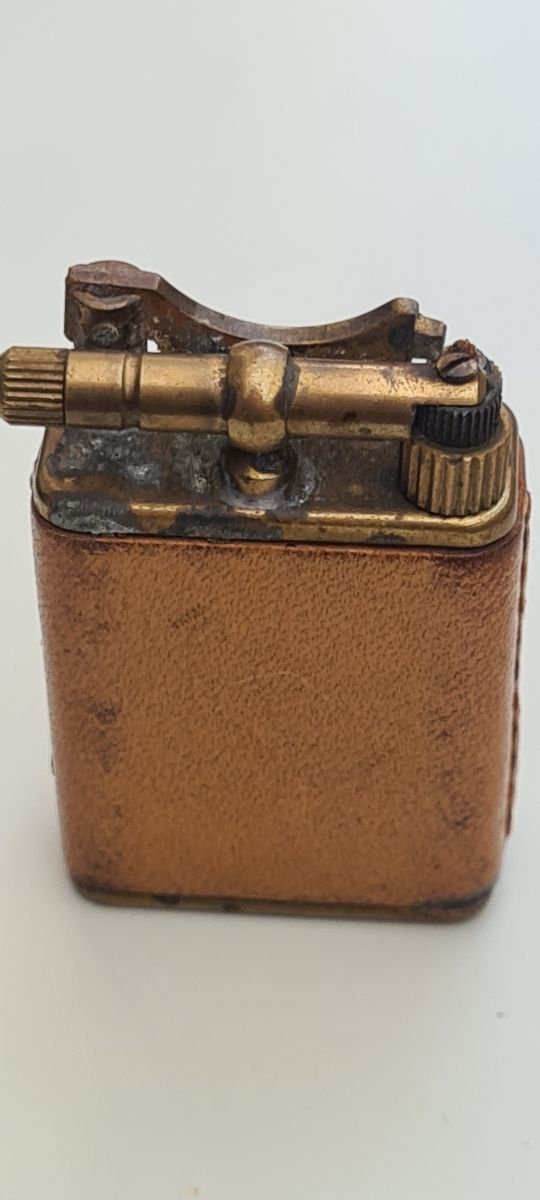 Mechero Jack de metal y cuero