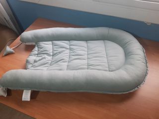 reductor de cuna, colecho