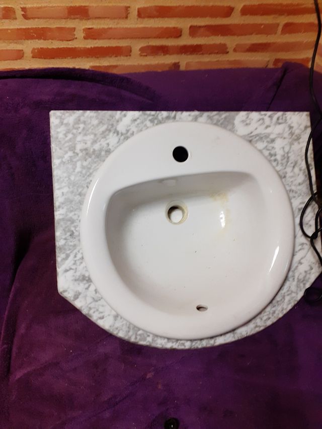 pica y piedra de marmol