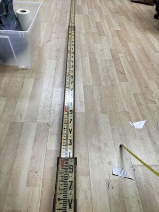 Herramienta de medida extensible antigua