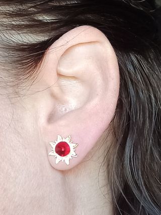 Pendientes de soles de plata chapada en oro 24k