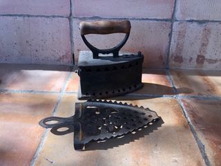 Antigua plancha de carbón