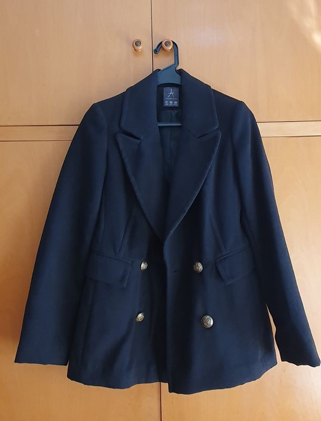 Americana negra de paño