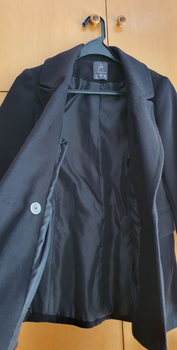 Americana negra de paño