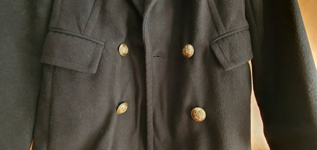 Americana negra de paño