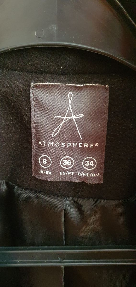 Americana negra de paño