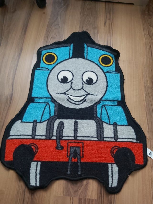Thomas,alfombra