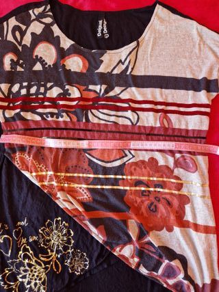 blusa de flores manga corta desigual talla  L