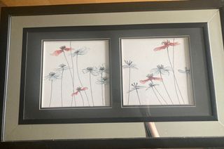 Cuadro flores con espejo alrededor