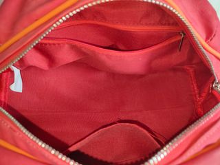 Bolso de mano rosa y naranja