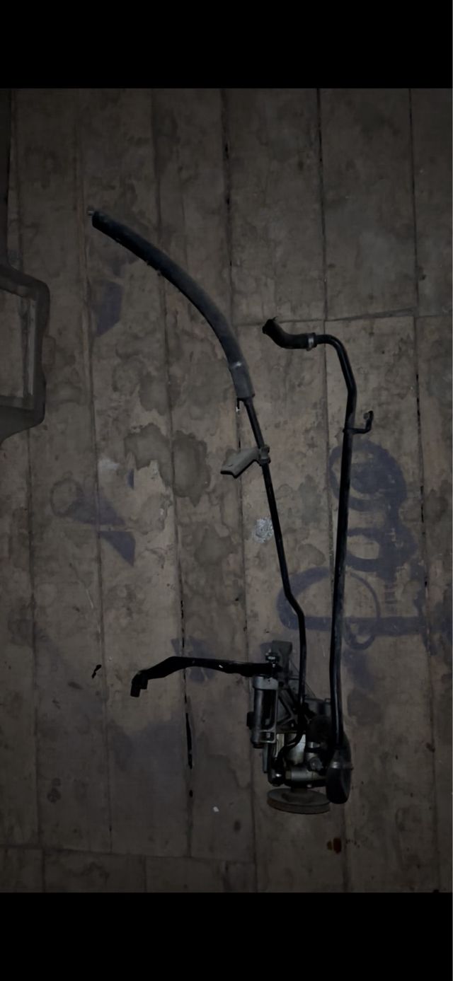 travesaño delantero con bomba de dirección