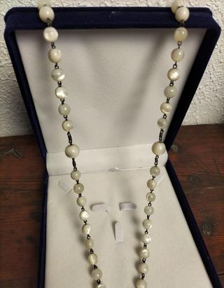 Espectacular crucifijo rosario de nácar y plata.