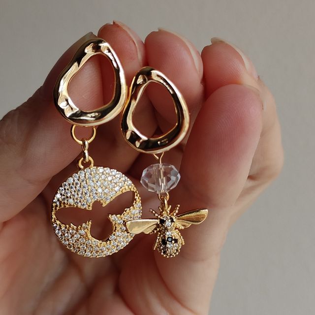 Nuevos pendientes únicos asimétricos circonio