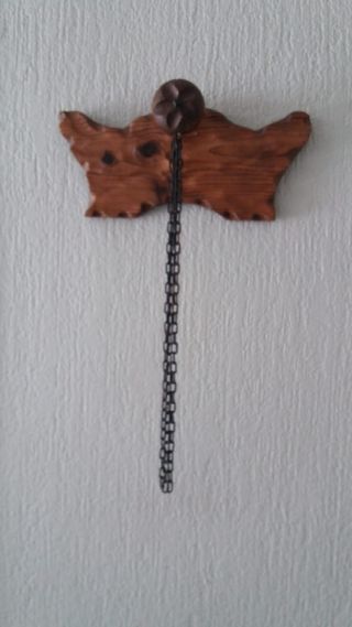 colgador madera y metal