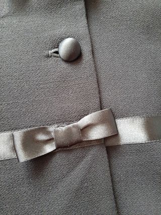Chaqueta de vestir con detalles de lazos en raso