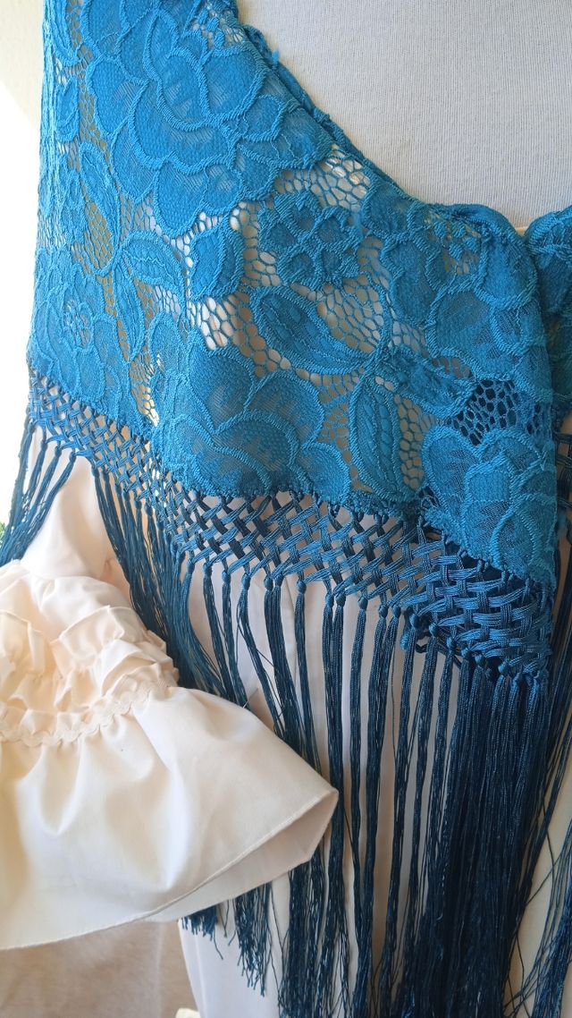 mantoncillo flecos verde esmeralda