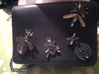 Bolsos , cartera y una mochila 