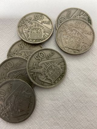 Monedas de 50 pesetas con la estrella del 58