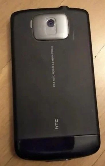 Teléfono movil HTC + Funda