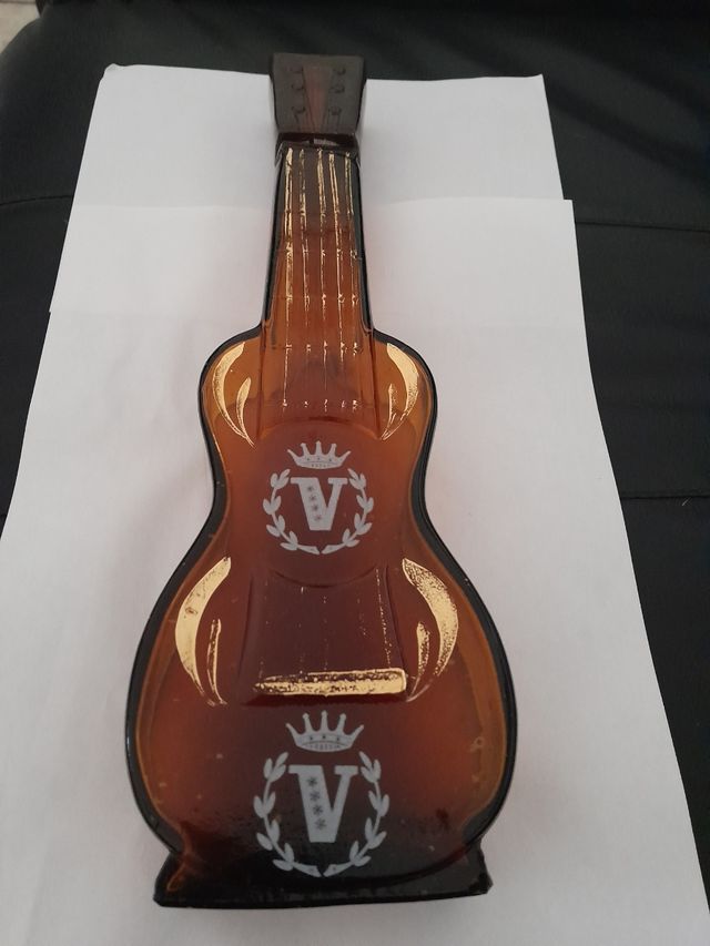 Botella guitarra,antigua.