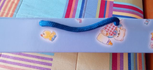 toalla de baño y babero a juego.