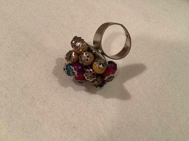 Anillo bolitas ajustable