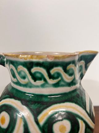 Coppia di candelabri in ceramica dipinta