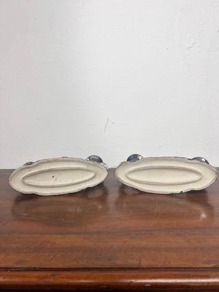 Coppia di candelabri in ceramica dipinta