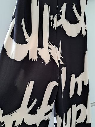 MONO ESTAMPADO NEGRO Y BEIGE