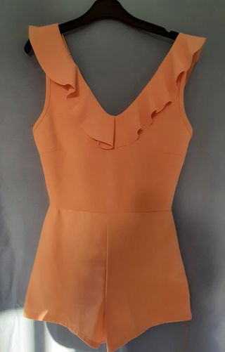 Mono chica color salmon