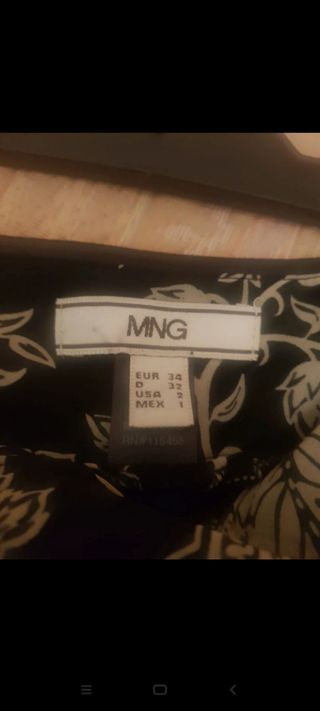 falda negra con estampado de mango 
