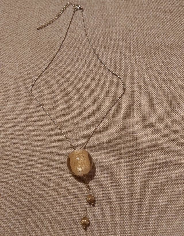 girocollo con pendende ambra