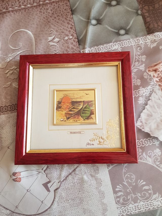 Quadretto su foglia oro. Tramonto al mare.