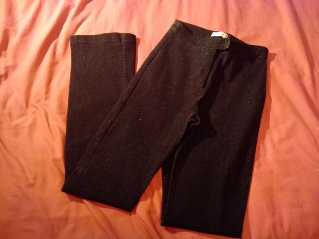 Pantalón acampanado elástico efecto brillo talla S