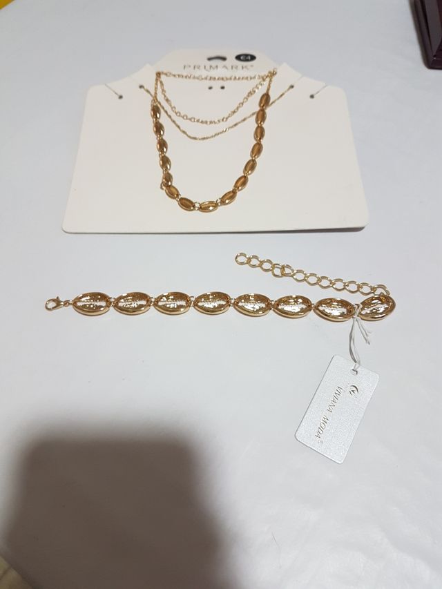 Collar varias cadenas y pulsera