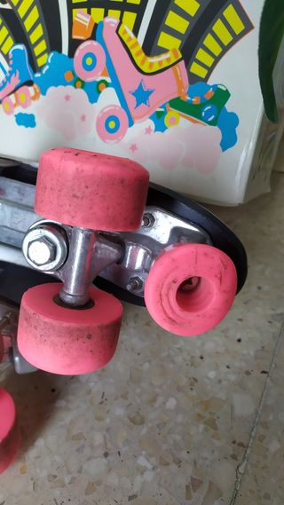 Patines rosas talla 35 con fundas regalo
