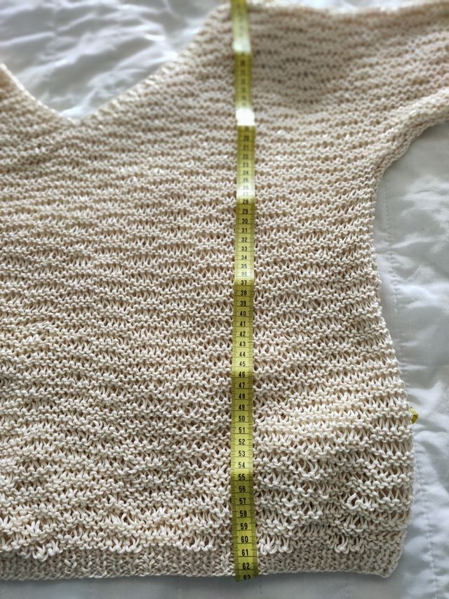 Amplio jersey de pico hecho a mano.