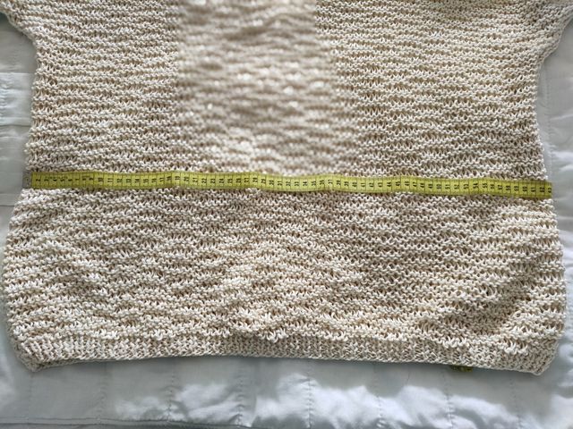 Amplio jersey de pico hecho a mano.