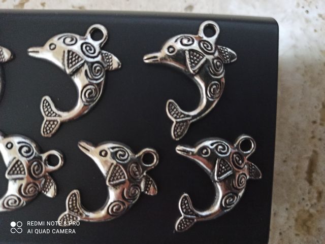 ciondoli metallici forma delfino