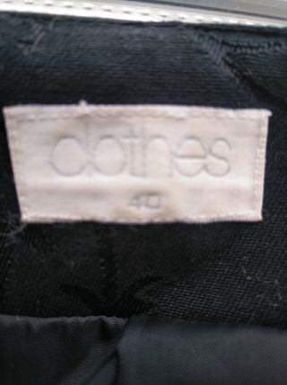 Clothes. Abrigo negro.