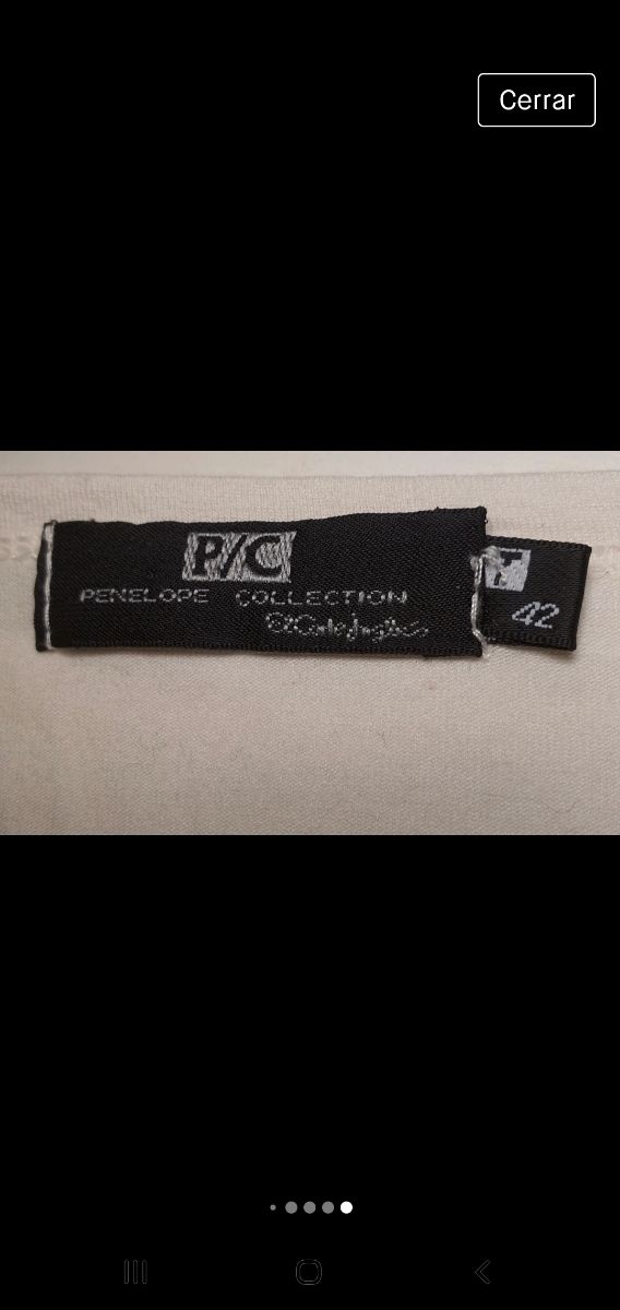 Camiseta con mangas de ganchillo y flecos.  Penélo