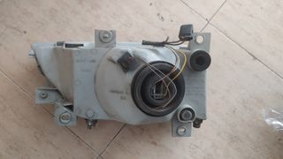 Faro delantero izquierdo FORD ESCORT 084311142L